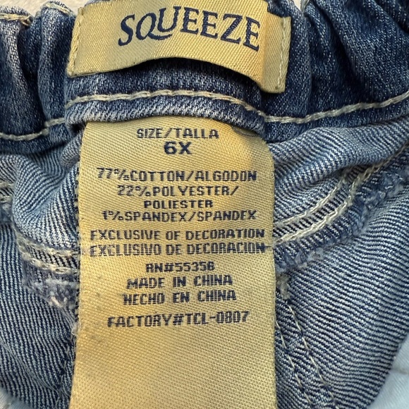 Squeeze Embroidered Distressed Blue Jeans for Little Girls
size 6X - Picture 6 of 7